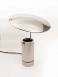 Rare "TOS" nickel-plated metal table lamp by Florian Schulz. Cylindrical fully chrome-plated base with an adjustable chrome reflector plate. Produced between the 1980s and 1990s.